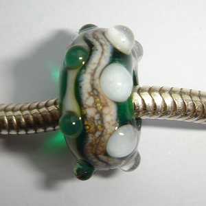 Transparent green with silvered ivory and different dots