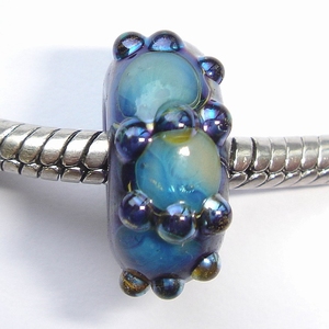 Blue with shiny spots and dots of silver glass