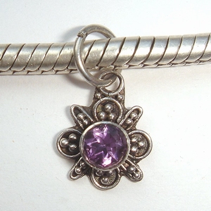 Sterling silver pendant with purple CZ in flower
