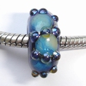 Blue with shiny spots and dots of silver glass 