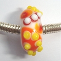White base with yellow, orange, red decorations 